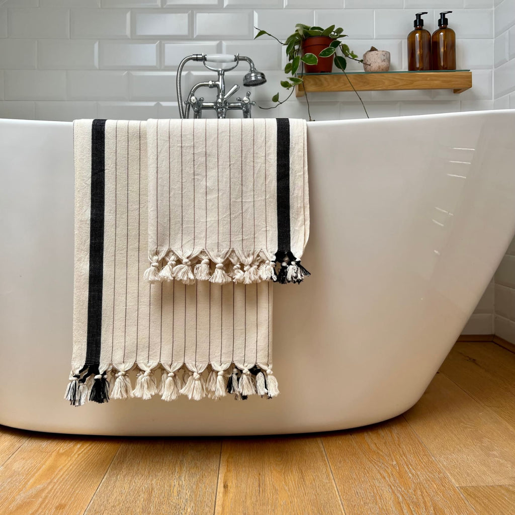 Capella_Cotton_Peshtemal___Hand_Towel_Bath_Mat_Cream_Taupe_Navy_Stripes_Draped_Over_bath_1